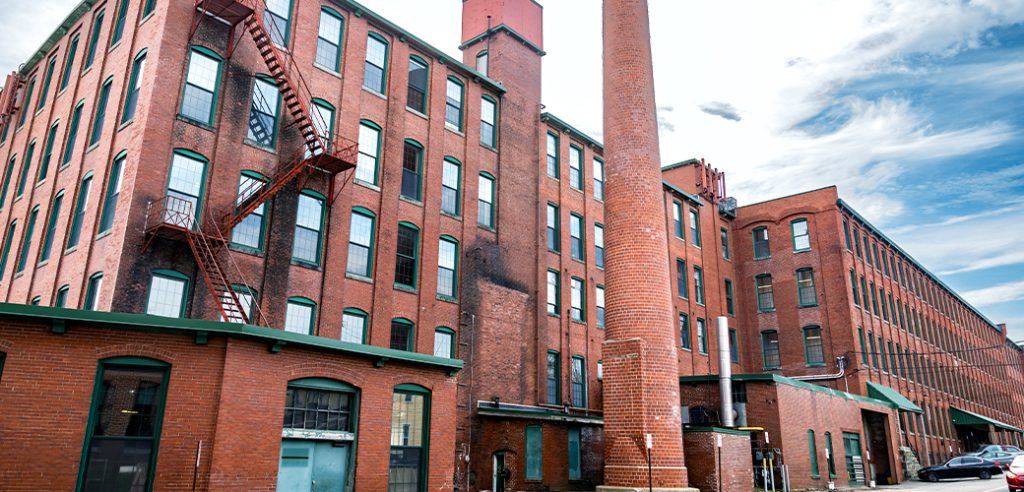 A large brick factory building exterior